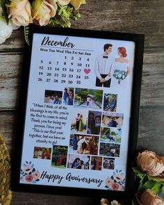 a calendar with photos and flowers next to it