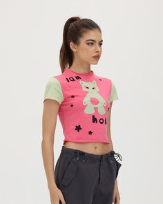 Model (WearingXS):• Height: 171cm | Bust: 83cm | Waist: 59cm | Hips: 89cmDetails: Pink T-shirt with "I am Hobby" meme graphic printTop Length: CroppedSleeve Length: Short SleevesMaterials:95% Cotton + 5% Spandex Y2k Crew Neck T-shirt With Character Print, Y2k T-shirt With Character Print For Streetwear, Y2k Character Print T-shirt For Streetwear, Y2k Style Character Print T-shirt For Streetwear, Fitted Pink Graphic Print T-shirt, Y2k Summer Top With Character Print, Y2k Style Character Print Summer Top, 90s Cotton Tops With Character Print, Pink Y2k Short Sleeve T-shirt