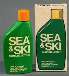 an unopened bottle of sea and ski suntan lotion next to the box