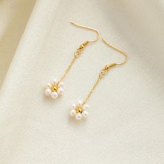 Freshwater Pearl Flower Earrings, Handmade Pearl Flower Jewelry, Beaded Earrings for Women, Wedding Jewelry, Bridal Gift, Gift for Her ✧Material: Freshwater Pearls + Stainless Steels All pearls are Real freshwater pearls💖 Handmade Freshwater Pearl Flower Earrings -- The Perfect Bridal Accessory These exquisite earrings feature delicate flowers handcrafted from freshwater pearls, embodying the bride's grace and elegance on her wedding day. Each pearl is carefully selected and meticulously woven Elegant Gold Flower Earrings With Dangling Beads, Elegant Flower-shaped Earrings With Dangling Beads, Elegant Gold Flower Beaded Earrings, Elegant Gold Flower-shaped Beaded Earrings, Dainty Flower Earrings With Ear Wire For Wedding, Dainty Pearl Drop Flower Earrings For Wedding, Elegant Flower Beaded Earrings For Wedding, Handmade Flower Pearl Earrings For Wedding, Handmade Flower Shaped Pearl Earrings For Wedding