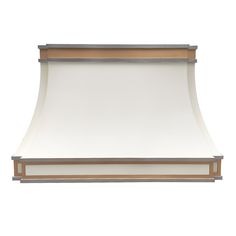 an image of a wall mounted hood with a white light on the top and gold trimming