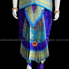 Design by Classical Dance Jewelry® ❥ Traditional Bharatanatyam costume wore during regular dance programs or arrangetram performance. ❥ Material : Art Silk ❥ Type : Traditional pant costume ❥ Easy to wear ❥ layer front fan ❥❥❥❥ 30 inch PANT LENGTH Dress Measurements ( all the measurements approximately 1 -2 margin buffer) Age: 7 - 9 yrs ❥ PANT MEASUREMENTS: ☛ Pant Length: 29-30 inch ☛ Pant Waist: 27-28 inch ☛ Pant Hip: 28-29 ❥ BLOUSE MEASUREMENTS: ☛ Blouse length: 10-11 inch ☛ Blouse Shoulder : Traditional Purple Ceremonial Wear, Blue Ceremonial Traditional Wear For Diwali, Blue Traditional Wear For Ceremonial Diwali, Traditional Wear In Paithani Silk With Tilla, Blue Traditional Wear For Diwali Ceremony, Traditional Saree For Dance With Traditional Patterns, Traditional Saree For Dance And Festivals, Traditional Saree With Dance Patterns, Traditional Drape Saree For Dance