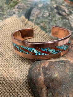 * Campitos Turquoise and Coral Inlay Copper Bracelet. *  Polished and Shiny.  Waxed Finished.  Other your finish will be done by the request.  Please contact. *  Lacquered will be done by the request. *  Both ends has 0.75" and 0.80 on center. * 3.2 mm thickness on 0.75".   *  Mark your wrist size on the option.   please make tight measure on the wrist bone.  Will be added 1/10" on your measure for comfortable.  Do not add or less on your measure.  you are ordering custom size and can not be exc Artisan Turquoise Copper Bracelet, Rustic Handmade Turquoise Cuff Bracelet, Inlay Jewelry, Turquoise And Coral, Turquoise Bracelet Cuff, Turquoise Cuff, Turquoise Rings, Copper Bracelet, Turquoise Jewelry