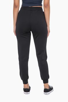 Unleash your inner athlete with our Everyday Comfort Jogger. Made from a soft and stretchy blend, these joggers feature an elastic waistband with a drawstring and convenient zippered pockets. Perfect for lounging or on-the-go, these cuffed joggers offer both comfort and style in one. Model is 5'8" Size 2 and wearing a Size Small. AP7013 Sporty Joggers With Elastic Waistband, Comfortable Activewear With Drawstring For Jogging, Comfortable Drawstring Activewear For Jogging, Stretch Sweatpants With Elastic Cuffs For Jogging, Activewear With Elastic Cuffs For Jogging, Stretch Sweatpants With Elastic Cuffs, Activewear With Elastic Cuffs For Sports, Sporty Activewear With Elastic Cuffs For Workout, Sports Activewear With Elastic Cuffs