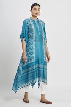 Shop for Krishna Mehta Blue Tussar Asymmetric Printed Tunic for Women Online at Aza Fashions Asymmetric Tunic, Tunics Online, Indian Prints, Embroidered Neckline, Embroidered Tunic, Designer Gowns, Womens Tunics, Kurti Designs, Mandarin Collar