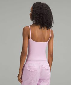 Simplicity, perfected. With delicate spaghetti straps and peach-fuzz-soft fabric, this classic cami tank effortlessly elevates any look. Designed for Casual. Fabric is double layered for coverage, support, and a seriously soft feel on both sides:Not too short, not too long, just right around the waistband:Contours your body with a fit that feels snug. For a more gentle feel, opt for a size up:XS = lululemon size 4, S = lululemon size 6, M = lululemon size 8, L = lululemon size 10, XL = lululemon size 12-14. Side seams are curved to gently accentuate your shape. New Fathers, Womens Tank, Cami Tanks, Tank Top Cami, Sleeveless Tank, Sleeveless Tank Top, Shirt Outfit, Tank Shirt, Tank Top Shirt