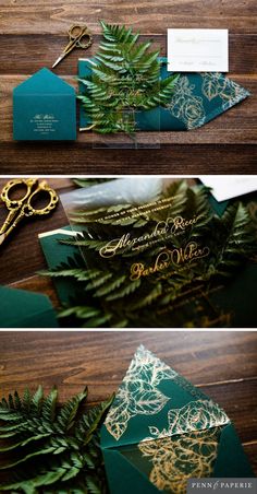 some green and gold wedding stationery on top of a wooden table next to scissors