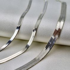 5.20mm, 3.10mm, 2.70mm Luxury Silver Snake Chain Necklace, Silver Luxury Snake Chain Necklace, Luxury Sterling Silver Snake Chain Necklace, Elegant Silver Herringbone Necklace For Formal Occasions, Elegant Silver Herringbone Necklace With Box Chain, Elegant Silver Snake Chain Necklace With Adjustable Chain, Classic Silver Herringbone Necklace With Adjustable Chain, Elegant Silver Herringbone Necklace With Adjustable Chain, Elegant Silver Snake Chain Necklace For Gift