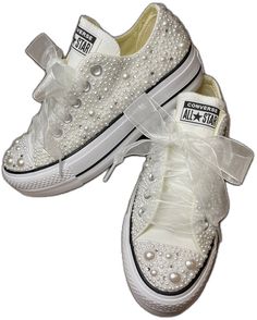 White Custom Sneakers With Rhinestones For Wedding, White Lace-up Custom Sneakers With Rhinestones, White Custom Lace-up Sneakers With Rhinestones, Custom Wedding Sneakers With Rhinestones, Wedding Custom Sneakers With Rhinestones And Round Toe, White Embellished Low-top Wedding Shoes, Custom Wedding Sneakers With Round Toe And Laces, Pearl Embellished Lace-up Wedding Sneakers, Wedding Low-top Sneakers With Rhinestones