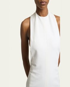 Jacquemus "Favola" solid dress    Halter neckline; lowcut back    Sleeveless    Midi length    Aline silhouette    Back zip    Viscose/nylon/polyamide/elastane    Elastane/nylon lining    Dry clean    Made in France Backless Elastane Dress With Back Zipper, Backless Dress With Back Zipper In Elastane, Sleek Fitted Sleeveless Maxi Dress, Sleeveless Midi Dress With Structured Boning For Cocktail, Sleeveless Cocktail Midi Dress With Structured Boning, Fitted Chic Maxi Dress With Closed Back, Chic Fitted Maxi Dress With Closed Back, Evening Stretch Sleeveless Elastane Dress, Sleeveless Halter Dress With Fitted Bodice For Cocktail