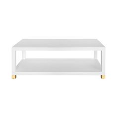 a white coffee table with gold wheels on the top and bottom shelf, against a white background