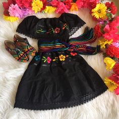 "Beautiful Mexican dresses hand embroidered! Beautiful dresses great for Mexican birthday party ! The style is off the shoulders, very pretty, I will include a sash that matches Better the embroidery. Each dress has unique embroidery, unique colors of Flowers, Hand made, hand embroidered. Back side of the dress is plain , no embroidery. Fabric: cotton- manta - not a see though fabric. Care : must be hand washed. Each dress has elastic band on waist and shoulders, very stretchy. WHEN CHOOSING A S Traditional Black Fiesta Dress, Traditional Black Dress For Fiesta, Black Embroidered Summer Dress For Fiesta, Black Embroidered Dress For Fiesta With Floral Details, Black Embroidered Dress For Fiesta In Spring, Black Embroidered Dress For Spring Fiesta, Black Embroidered Dress For Fiesta, Black Dress With Floral Embroidery For Fiesta, Black Spring Fiesta Dress