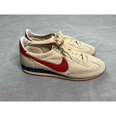 Retro Nike Sneakers With Rubber Sole, Retro Nike Sneakers With Round Toe, Retro Nike Leather Sneakers, Nike Retro Leather Sneakers, Classic High-top Running Shoes With Vibram Sole, Classic Nike Running Shoes With Branded Insole, Vintage Cushioned Sneakers For Streetwear, Vintage Sneakers With Cushioned Footbed For Streetwear, Classic Nike High-top Running Shoes