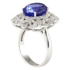 Stamped: 14K White GoldTotal Ring Weight: 8.5 GramsRing Length: N/ARing Width: N/AGemstone Weight: Total Natural Tanzanite Weight is 5.97 Carat (Measures: 12.00x9.60 mm)Color: BlueDiamond Weight: Total Natural Diamond Weight is 1.00 CaratColor: F-G, Clarity: VS2-SI1Face Measures: 22.55x19.95 mmSku: [704102W] Oval Tanzanite Diamond Ring In White Gold, Oval Diamond Gemstones For Formal Occasions, Elegant Oval Gia Certified Gemstones, Formal Oval Diamond Gemstones, Oval Tanzanite Diamond Ring For Anniversary, Exquisite Oval Gemstones For Formal Occasions, Exquisite Oval Gemstones For Formal Events, Formal Tanzanite Diamond Ring, Oval Shape, Formal Tanzanite Diamond Ring Oval Shape