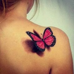 a woman with a pink butterfly tattoo on her back