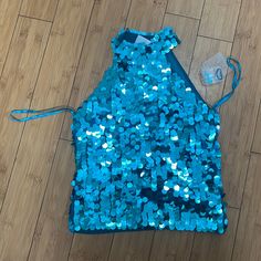 Frost Blue Top Fits Like S/M Light Blue Tops For Summer Parties, Light Blue Summer Party Tops, Light Blue Party Tops For Summer, Blue Sequined Summer Tops, Blue Sequined Tops For Summer, Blue Sequined Tops For Spring, Blue Fitted Top For Party, Light Blue Sleeveless Top For Night Out, Blue Party Tops For Spring