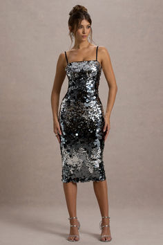 Designed to dazzle, add Azure to your party wardrobe this event season. Crafted in a glistening sea of silver sequins that create a mirror like shine, this midi dress was made to step out onto the dance floor. Complete with a lace-up back for a custom fit, pair yours with a sleek updo to show off all Azure has to offer.

Features
- Premium disc sequin
- Bodycon fit
- Square neckline
- Adjustable cami straps
- Lace-up back
- Split hemline
- Midi length 

Sizing & Fit
Model is 5'7 and wears UK size 8 / US size 4

Product Information
Designed exclusively by Club L London
Lined with no stretch 
Premium sequinned satin in Silver (100% Polyester) 
120cm total length 
SKU: CL135147013 Glamorous Gala Dresses With Contrast Sequin, Sleeveless Shimmer Sequin Dress For Gala, Sequined Midi Evening Dress For Prom Season, Sequin Midi Dress For Evening Prom, Shimmer Sequin Fabric For Cocktail Party Season, Sequin Fabric With Shimmer For Cocktail And Party Season, Party Season Cocktail Sequin Fabric With Shimmer, Metallic Sequin Dress For Holiday Party, Glamorous Midi Sequin Dress For Prom Season