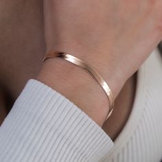 Introducing the Herringbone Bracelet- 4mm, now in 14k Rose Gold! This sleek bracelet is sure to become your next staple piece adding just enough style and simplicity to any look. Featuring a classic herringbone pattern, this piece reflects light from every angle and complete with our signature 'G' clasp. Rock it solo, or pair it with the Herringbone Necklace in Rose Gold for a matching set! This product is guaranteed for life – GLD will repair or replace the item should you experience any defect Herringbone Bracelet, Herringbone Necklace, Vermeil Jewelry, Custom Earrings, Gold Plated Bracelets, Herringbone Pattern, Drop Necklace, Pendant Bracelet, Staple Pieces