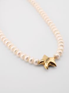 Handcrafted Starfish Pearls Necklace, embodying elegance and artistry. Drape yourself in this luxurious accessory, adorned with lustrous pearls and a delicate starfish pendant. Every piece is unique They are made by hand in Florida. Available in 16" and 18". Both sizes feature a 2" extension chain.” long Starfish-shaped Necklace With Pearl Charm For Gift, Star-shaped Pearl Charm Jewelry, Pearl Necklace With Star Charm As Gift, Pearl Necklace With Star Charm For Gift, Elegant Starfish Charm Star Necklace, Elegant Starfish Charm Necklace, Elegant Star-shaped Necklace With Starfish Charm, Elegant Starfish-shaped Pearl Charm Jewelry, Star-shaped Pearl Jewelry For Gift