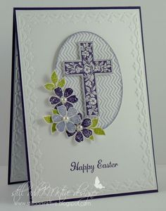 an easter card with flowers and a cross