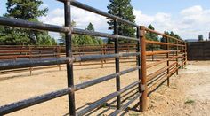 the fence is made of metal and wood