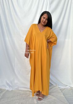 Celebrate your curves with our plus size kaftan dress. Created to embrace all body types, this kaftan is designed with care and style in mind. Its loose, flowing silhouette complements your figure while offering unbeatable comfort. The perfect choice for a night on the town or lounging at home. Free Size Dress With Batwing Sleeves, Free Size Batwing Sleeve Dress, Beachwear Kaftan Tunic, Oversized Tunic Kaftan For Beachwear, Flowy Maxi Tunic For Loungewear, Flowy Maxi Length Tunic For Loungewear, Relaxed Fit Tunic With Kimono Sleeves, Oversized Batwing Sleeve Kaftan For Vacation, Oversized Kaftan With Batwing Sleeves For Vacation