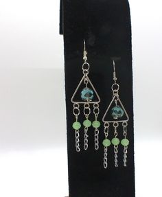 Add a touch of nature-inspired charm to your jewelry collection with these wire dangle earrings. Handcrafted with care, these earrings feature intricately beaded glass beads in a gorgeous shade of earthy green. The delicate silver wire adds a hint of elegance, creating the perfect accessory for any occasion. Embrace your love for all things green with these unique and eye-catching earrings, a true reflection of the beauty found in the natural world. To prolong the life of your jewelry remember t Pretty Beaded Jewelry, All Things Green, Earthy Green, Bronze Earrings, Water Activities, Etsy Earrings Dangle, Silver Wire, Natural World, Green Glass