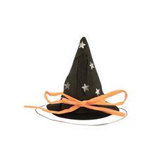 a witches hat with orange ribbon and stars on the front, sitting on top of a white plate