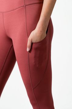 Calling the athletes  These high waisted leggings are breathable, lightweight, and held tight with a drawstring on the waistband. Created to be an athletic running legging that has the versatility to be dressed down on a casual day. The subtle pockets around the waistband allow for storage of  keys, credit cards, and a Functional Tight Activewear With Elastic Waistband, Sporty Full-length Tights With Elastic Waistband, Sporty Full Length Tights With Elastic Waistband, Compression Functional Leggings With Comfort Waistband, Compressive Sporty Yoga Pants For Running, Sporty Compressive Yoga Pants For Running, Sporty Red Compression Yoga Pants, Sporty Tight Leggings With Ribbed Waistband, Functional Running Leggings With Elastic Waistband