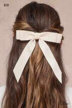 Chic and feminine, adding the Lulus Graceful Presence Ivory Bow Hair Clip Set to any look will make it instantly cuter! Sleek woven fabric shapes this essential set that features two classic hair bows that with a two-layered design and effortlessly elegant long tails. Silver barrette closures will perfectly secure your locks for a hairdo that lasts all day! Bow Measures 5. 5" Wide. Ribbon Measures 6. 25" Long. 90% Polyester, 10% Iron. Imported. Lulus | Graceful Presence Ivory Bow Hair Clip Set. Bow Barrette, French Clip, Satin Ribbon Bow, Velvet Hair, Ribbon Hair Bows, French Barrette, Ribbon Hair, Matte Satin, Satin Bow