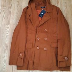 Nwt Brown/Camel Canvas Pea Coat. The Tag Says Xxl, But This Would Probably Fall Into The Lg/Xl Category. Im Going To List It As A Large To Be Safe. Let Me Know If You Have Any Questions! Brown Hooded Outerwear For Work, Casual Double-breasted Outerwear, Casual Khaki Pea Coat With Buttons, Hooded Brown Outerwear For Work, Casual Cotton Pea Coat For Fall, Fitted Camel Casual Outerwear, Casual Beige Pea Coat With Pockets, Casual Beige Collared Pea Coat, Casual Brown Pea Coat With Pockets