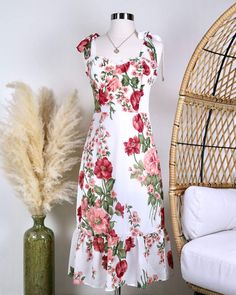 This beautifully constructed long dress features a tie strap design, smock back with hidden zipper,... Midi Floral Dress, Floral Midi Dress