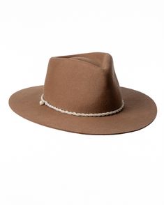 The Camel Felt Hat is an updated version of Ferdinand Marrone. It comes in mulseing-free wool produced in our 200-year-old hat factory. The edge is cut, brim is shapeable and has an inside size-adjustable strap. The hat is decorated with a handmade twisted strap in the color beige. Attached on the right-hand side is our white signature pearl. Unisex. Steel Lighting, Felt Hat, Wide Brimmed, Hat Sizes, The Edge, Wool Felt, Stockholm, Camel, Adjustable Straps