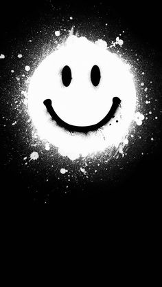 a black and white photo of a smiley face