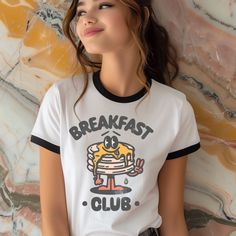 This retro groovy breakfast club is perfect on this super soft ringer tshirt.  This is the perfect gift for you brunch lover. Cotton T-shirt With Letter Print For Brunch, Vintage Cotton Tops For Brunch, Cotton Graphic Print T-shirt For Brunch, Screen Print Crew Neck T-shirt For Brunch, Crew Neck T-shirt With Screen Print For Brunch, Trendy White T-shirt For Brunch, Cute Pancakes, Club Tshirt, Ringer Shirt