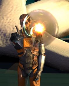 a man in an orange and black space suit holding a light up hand next to a large white object