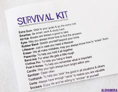 the survival kit is sitting on top of a piece of paper that says survival kits