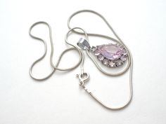 Vintage CZ Jewelry - This is a sterling silver snake chain with a pink ice cubic zirconia pendant. The pendant is 1.25" long (includes bale), .63" wide, and hallmarked 925. Chain is 18" long, hallmarked 925 four times, Italy twice. Total weight for the necklace and pendant is 7.3 grams. Pictures don't do this pendant justice. Pink Snake Chain Jewelry Gift, Pink Sterling Silver Snake Chain Jewelry, Silver Snake Chain, Cz Jewelry, Sterling Silver Necklace Pendants, Silver Pendant Necklace, Snake Chain, Sterling Silver Pendant, Sterling Silver Pendants