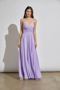 You'll be destined for love in the Tied Back To You Lavender Maxi Dress! Sleek woven fabric shapes this stunning maxi dress with a surplus, V-neckline and pleated, princess seamed bodice supported by spaghetti straps that carry into an alluring lace-down open back. A high, banded waist sits atop a stunning A-line skirt that falls to a maxi hem. Maxi Dress Color: Lavender Fit: True to size Surplus V-neckline Adjustable shoulder straps High waist A-line skirt Fitted bodice Sewn-in padded cups Plea Lavender Beach, Lavender Maxi Dress, Beach Maxi Dress, Pleated Bodice, Grad Dresses, Skirt Fits, Princess Seam, Tie Dress, Fitted Bodice