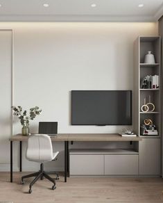 a room with a desk, chair and television on the wall next to a bookcase