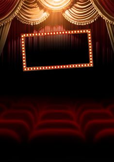 an empty theater stage with red curtains and lights