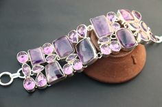 Natural Amethyst stone handmade silver plated bracelet |Vintage Amethyst gemstone bracelet| Gift for her on Anniversary. stone name -Amethyst stone color -Purple and grey metal plating - silver oxidized material - brass Benefits for wearing a Amethyst gemstone Amethyst Provides Serenity. Amethyst Promotes Hormone Balance. Amethyst Can Help With Weight Loss. Amethyst Detoxifies the Body. Amethyst Reduces Headaches. Amethyst Helps With Other Physical Issues. Amethyst Provides Stress Relief. HAPPY Hormone Balance, Grey Metal, Silver Plated Bracelet, Bracelet Vintage, Nature Bracelets, Amethyst Stone, Amethyst Gemstone, Handmade Sterling Silver, Gemstone Bracelet