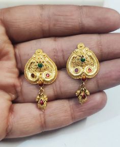 22k Gold Earrings, Solid Gold Earrings, Enamel Gold Studs, Indian Gold Earrings, Rajasthani Gold Stud, Ethnic Gold Studs, Good Jhumka Studs Beautiful and Elegant Rajasthani stud earrings. It's perfect for any outfit. Handmade Gold studs with Pure Indian Ethic Design and Essence. Metal: 22k Hallmarked Gold Theme: Indian Floral Theme Weight: 5.7 grams a pair approx. Length: 32mm Width: 17mm approx All our Jewellery is made with love and care in our own workshop. 22k Gold Meenakari Earrings For Celebrations, Gold Meenakari Drop Earrings, Gold Meenakari Temple Earrings, Festive 22k Gold Traditional Earrings, Festive Traditional 22k Gold Earrings, Traditional Gold-plated Earrings For Celebration, Traditional Gold Plated Earrings For Celebration, Traditional Gold Plated Celebration Earrings, Ornate Gold Danglers With Meenakari