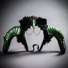 This Gothic Demon Reven Skull Rose headband with Large Horn is great for your Gothic Demon costume, with the 5 inches flexible headband with wrap around the head and it can fit on most adults. Even with both large horns, the headband's total weight ~7oz you can wear this comfortably to your party without too much weight on your head.   Feature: Material: Plastic Resin and hand painted Style: Demon Gothic Hair Accessories Occasion: Halloween Party, Costume Party, Masquerade Dress up Party. Size: Black Novelty Costume Accessories For Fantasy Events, Fantasy Masks And Prosthetics For Costume Party, Halloween Cosplay Costume Hat Headband, Halloween Cosplay Costume Headband, Themed Masks And Prosthetics For Cosplay Events, Themed Masks And Prosthetics For Party And Cosplay Events, Punk Headpieces For Halloween Cosplay, Gothic Headband Costume Accessories For Cosplay, Witchy Costume Accessories For Cosplay Carnival