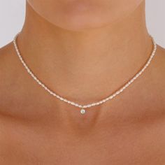 Don't miss out on this timeless classic! Treat yourself to the CZ Pearl Charm Gold Necklace, featuring a shining cz pendant, and a pearl necklace that'll keep you looking good for years to come. Because nothing says sophistication like having classy style! DETAILS & SIZE Finish: 18K gold plate Materials: .925 Sterling silver, CZ stones, faux pearls Measurements: Pendant: 6mm width; Chain: 16" + 2" extension Lobster claw clasp Shop our Necklaces for more options to layer this with! Virgo Jewelry, Pearl Necklace Silver, قلادات متدلية, Evil Eye Hand, Rose Quartz Necklace Pendants, Arrow Jewelry, Necklace Extender, Silver Pearl Necklace, Rose Quartz Necklace