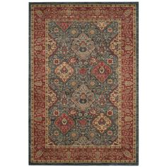 a blue and red rug with an ornate design on the bottom, in various colors