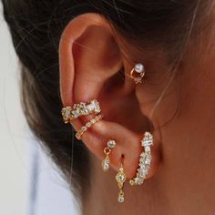 Oh, how chic is this sweet earring set. Llyod's delicate cluster style stone design, set in a cuff and lobe conch setting, makes this the ultimate ear companion. Style alongside your other simple studs for chic accessorizing. Created with a sterling silver base and utilizing luxury 14 karat gold plating, this Adorn Luxe earring is everything you love about our standard collection, but with a ‘demi-fine’ jewelry finish. Crystal Anklet, Sweet Earrings, Stacked Earrings, Luxe Jewelry, Silver Ear Cuff, Jewelry Accessories Ideas, Funky Jewelry, Demi Fine Jewelry, Ear Cuffs