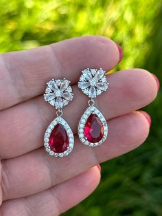 Cubic zirconia and ruby red crystal earrings!  perfect jewellery for weddings, special occasion. Custom colours available earrings are 1 inche or 2,5 cm long approx Red Drop Bridal Earrings For Formal Occasions, Elegant Ruby Bridal Earrings For Wedding, Elegant Red Bridal Earrings For Anniversary, Red Teardrop Crystal Earrings For Wedding, Red Drop Crystal Earrings For Anniversary, Red Dangle Bridal Earrings For Anniversary, Red Crystal Formal Earrings, Formal Red Round Bridal Earrings, Red Crystal Round Earrings