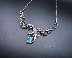 This art nouveau necklace wrapped in silver wire with a natural blue Labradorite.                                                                                                                                                It can be a unique decoration for a festive occasion or lovely gift. Elven Wedding, Art Nouveau Necklaces, Bohemian Style Jewelry, Art Nouveau Pendant, Fairy Necklace, Unique Decoration, Labradorite Necklace, Diy Wire Jewelry, Art Nouveau Jewelry