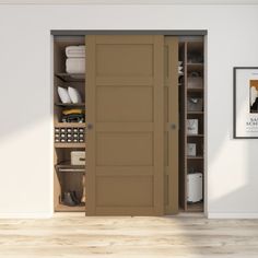 an open closet door in a white room